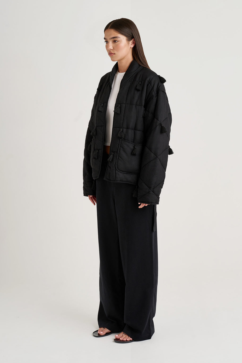 Womens 3/4 Dromen Tassel Jacket wearing pants on a white background