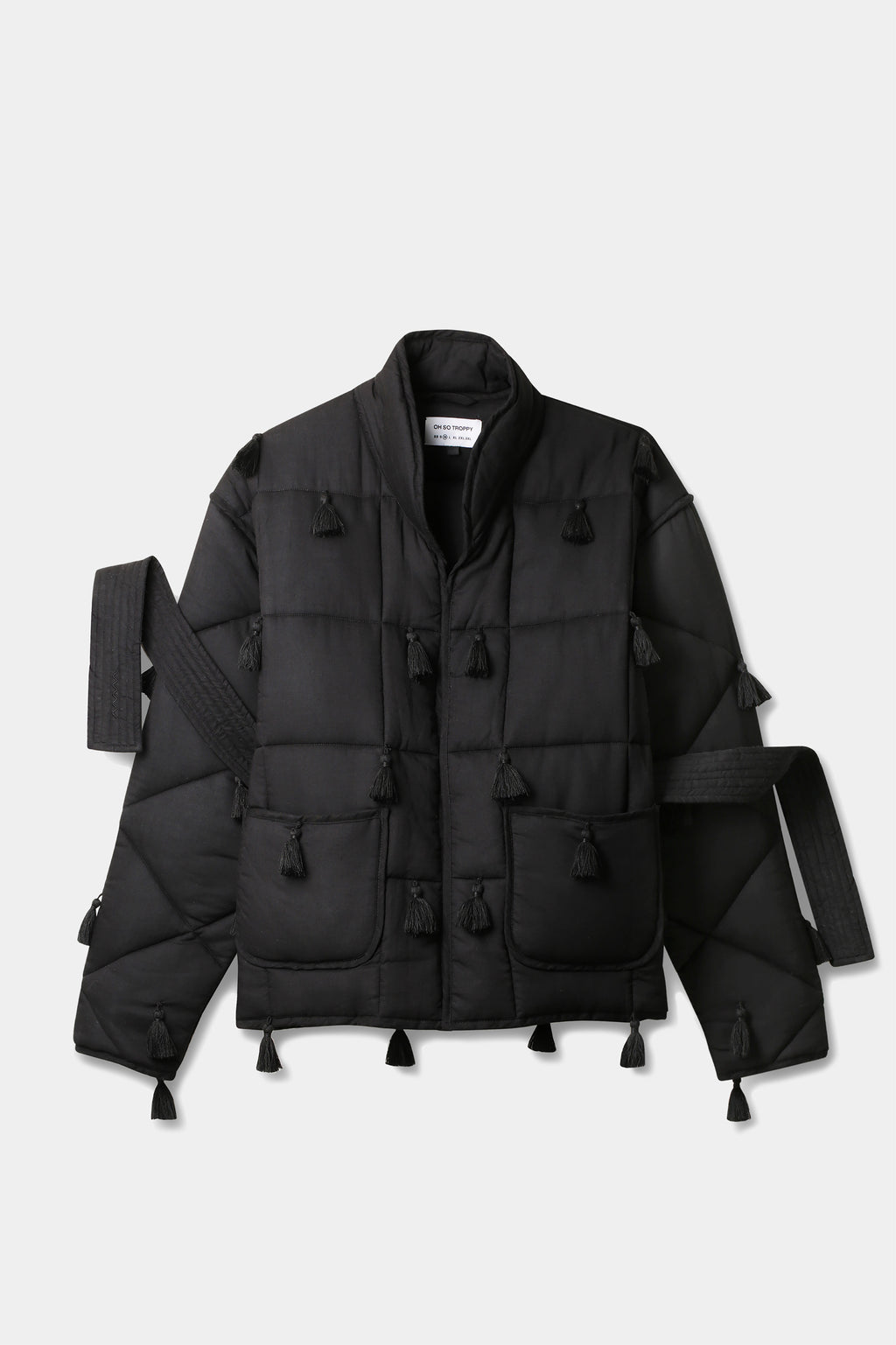 Black Dromen Tassel Jacket with tassel details on a light gray background