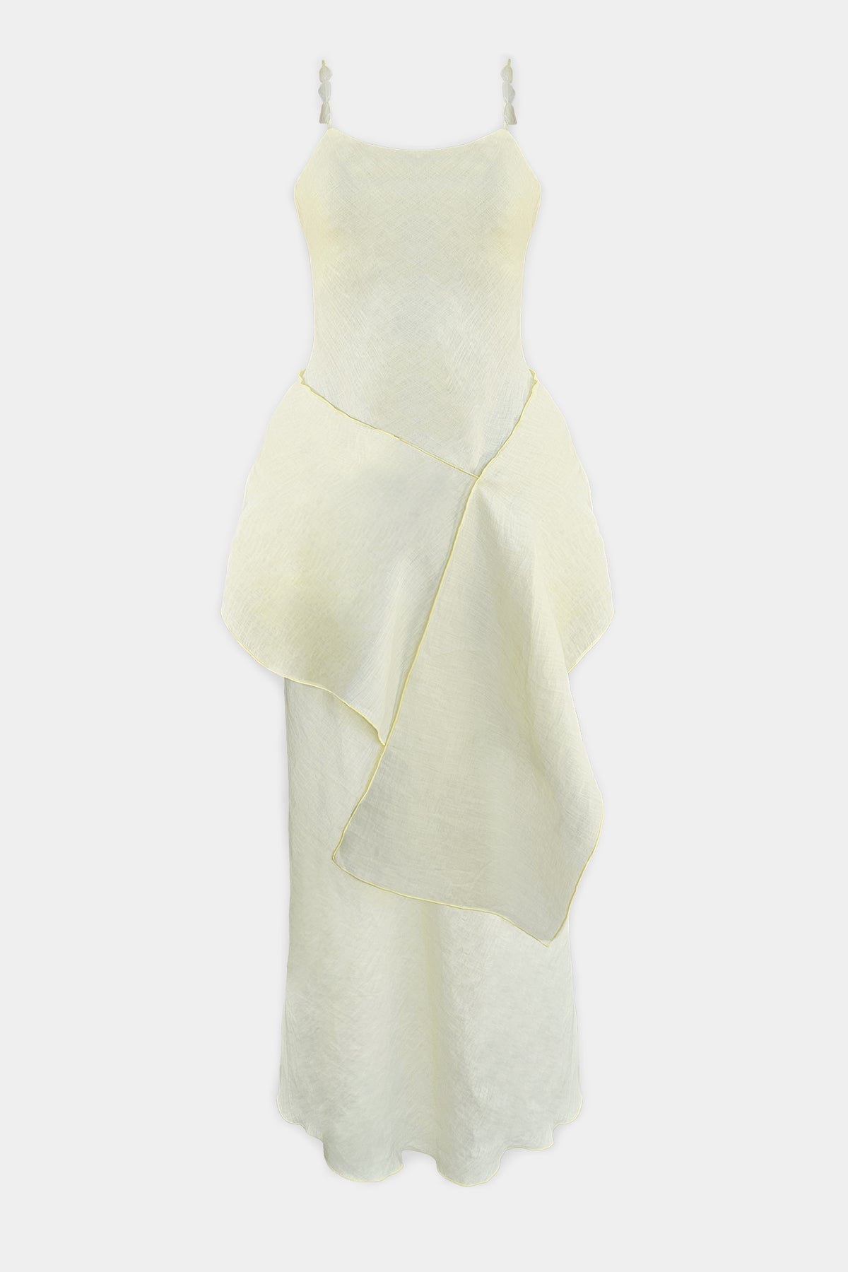 A pale lemon sleeveless dress with thin shoulder straps and beads, a fitted bodice, and an asymmetrical draped overlay, shown against a plain light gray background.