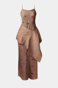 A sleeveless, maxi dress in a brown linen fabric, featuring thin spaghetti straps, a structured bodice with decorative gems and stones, and a draped waist wrap.